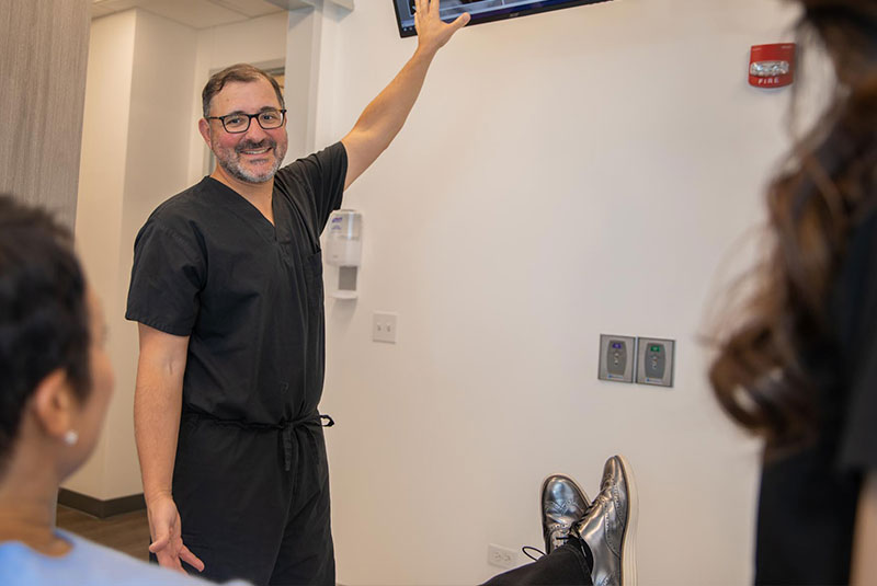 Dr. Mandelaris showing implant procedure